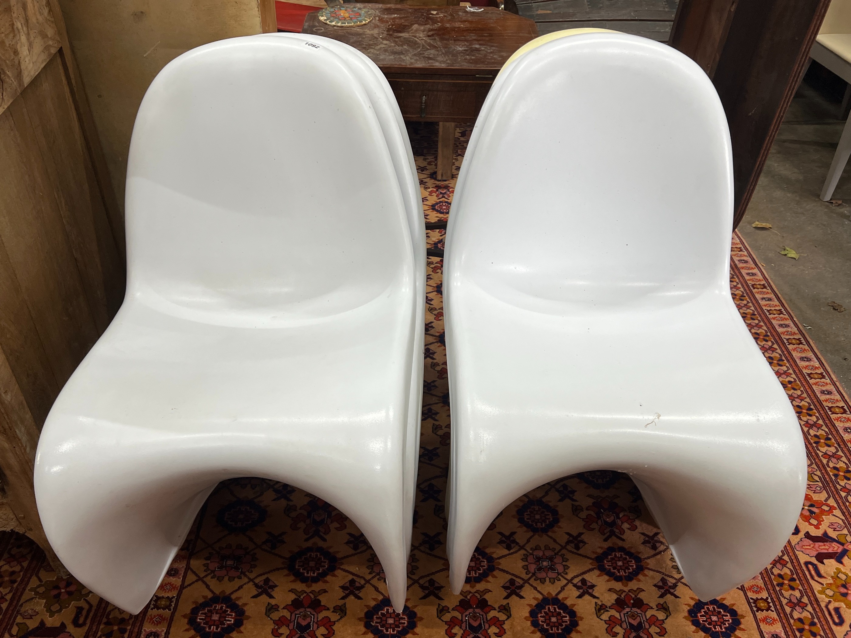 A set of six Vitra Panton style chairs, one differing in colour